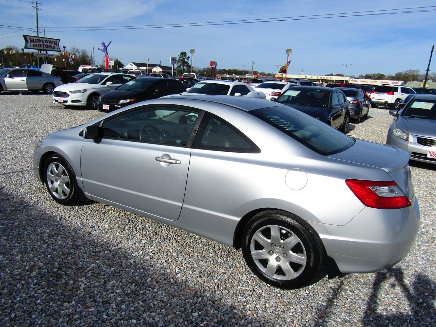 2011 Silver Honda Civic LX Coupe 5-Speed AT (2HGFG1B66BH) with an 1.8L L4 SOHC 16V engine, Automatic transmission, located at 15016 S Hwy 231, Midland City, AL, 36350, (334) 983-3001, 31.306210, -85.495277 - Photo#4